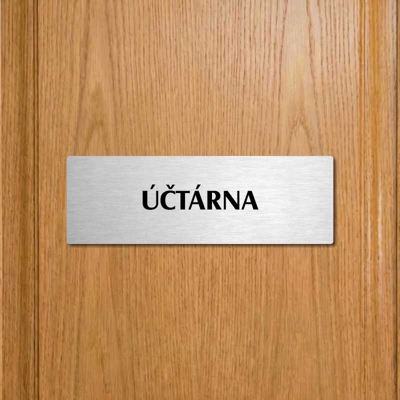 Účtárna, 240x79mm, zlatá popiska s ozdobou uprostřed